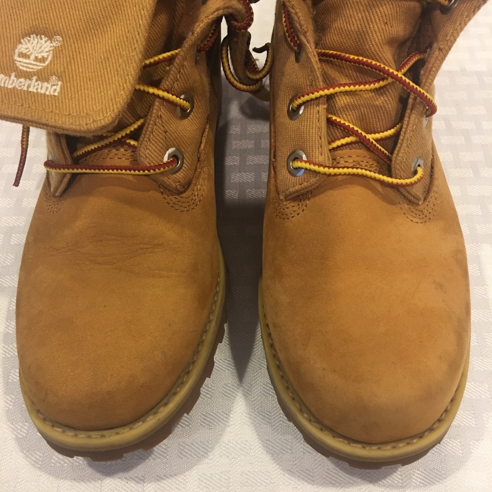 Girls fold down timberlands.